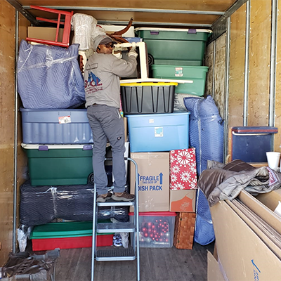 OCL Moving Inc. packing the truck